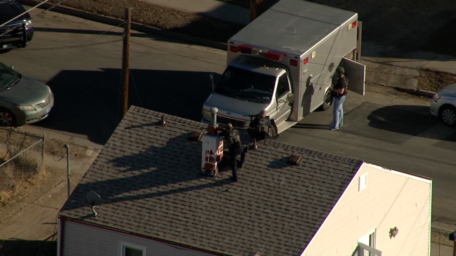 Englewood SWAT standoff ends with officer involved shooting; hostage